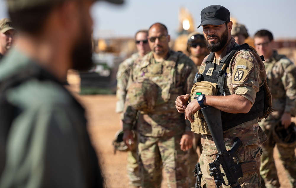 Syrian Partner Commander Briefs Troops Ahead of Joint Air Assault Training with 10th Mountain Division