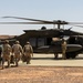 Syrian Partners and 10th Mountain Infantrymen Board Black Hawk During Joint Air Assault Training