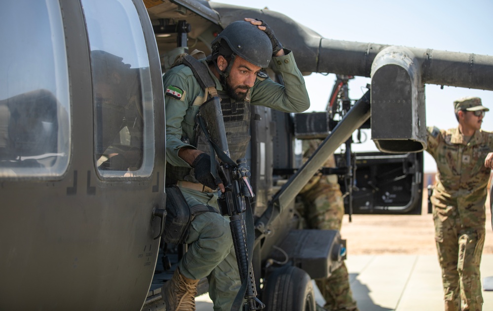 Syrian Partner Soldier Exits Black Hawk During Coalition Air Assault Training