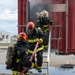 Firefighters conduct structural live fire training