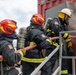 Firefighters conduct structural live fire training