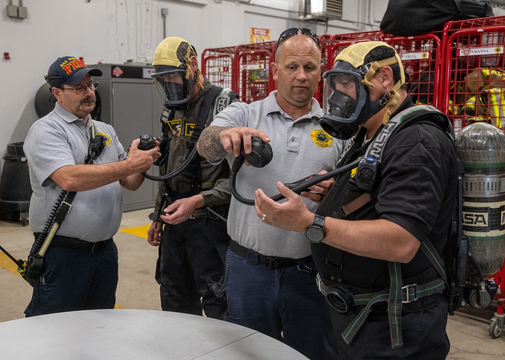 Firefighters conduct structural live fire training