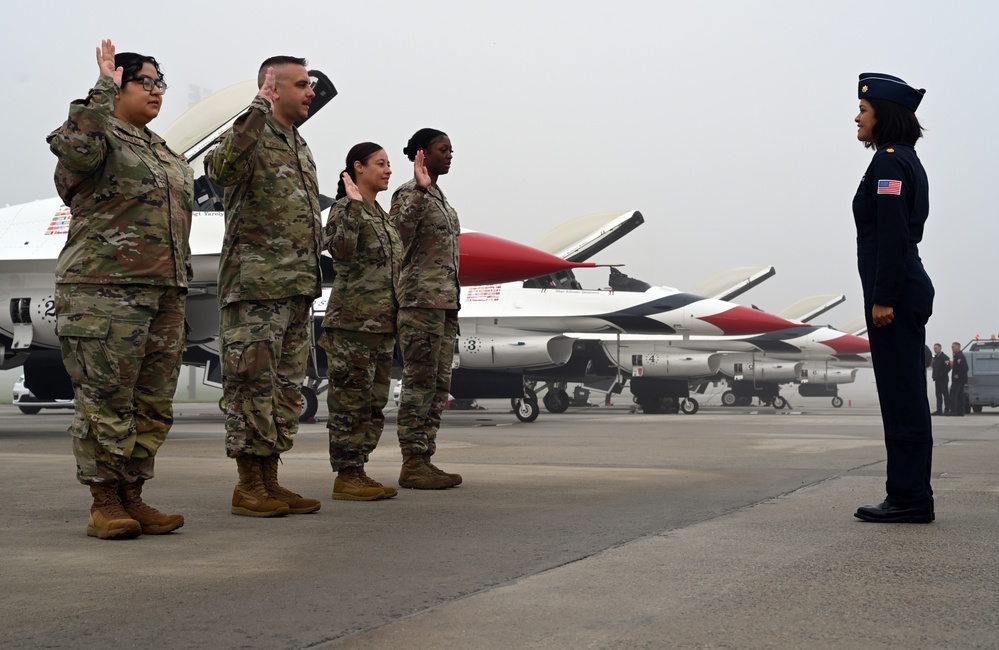 305 AMW members reenlist during airshow