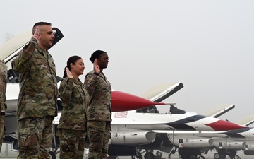 305 AMW members reenlist during airshow