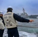 Boatswain’s Mates coordinate with the midship fuel replenishment team for an underway replenishment