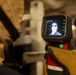 U.S. Navy Sailors demonstrate the functionality of the Naval Fire Fighter Thermal Imager (NFFTI)