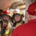 Damage Controlman 1st Class Cody Dormady provides instruction to the primary attack team