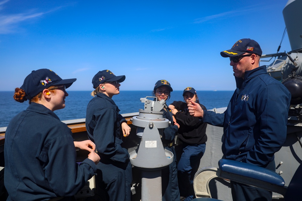 Cmdr. Michael Schelcher explains the specifications of the close in weapons system