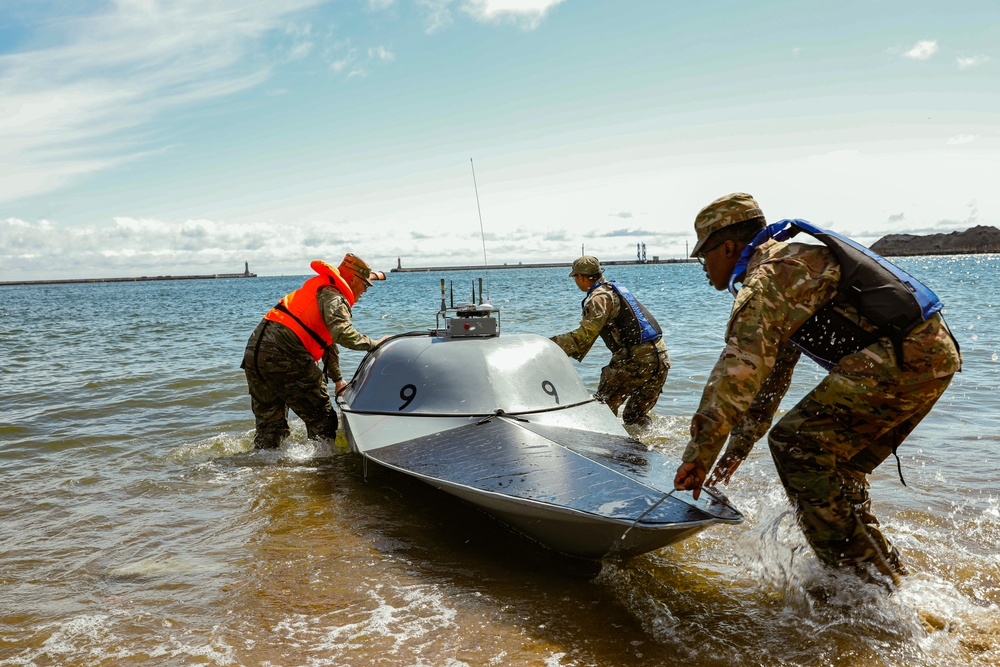 U.S. Navy Seamen and U.S. Army Soldiers Launch USV's for Arcane Thunder 25