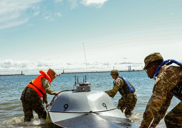 U.S. Navy Seamen and U.S. Army Soldiers Launch USV's for Arcane Thunder 25