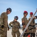 Airmen demonstrate rescue equipment to Army engineers during joint training