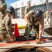 Airmen inspect rescue knots during joint training