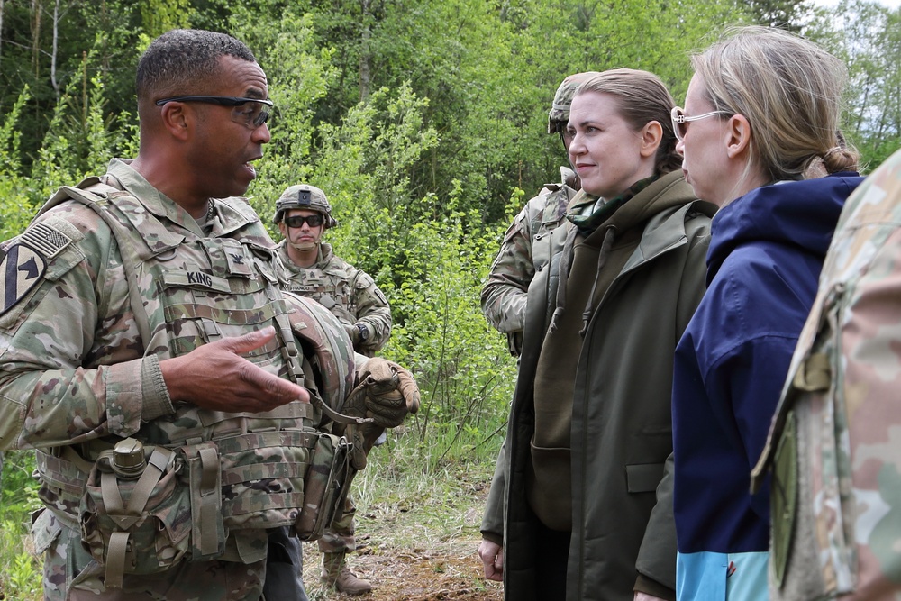 The Lithuanian Minister of Defense and the US Ambassador meet with US forces