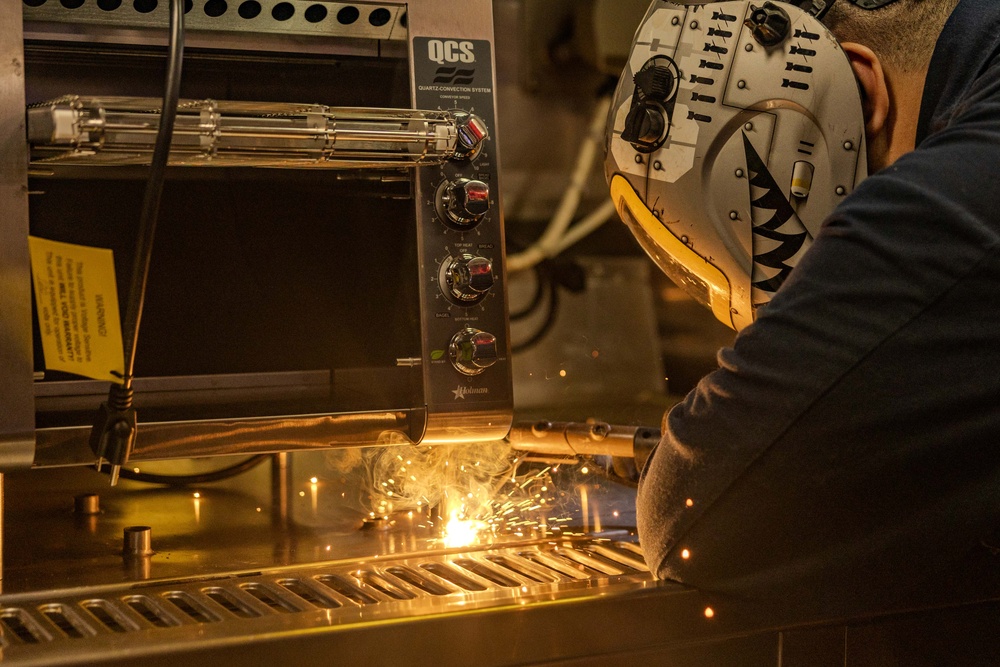 Maintenance aboard USS Ralph Johnson