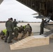 U.S. Marines Load KC-130 for Movement to Scotland