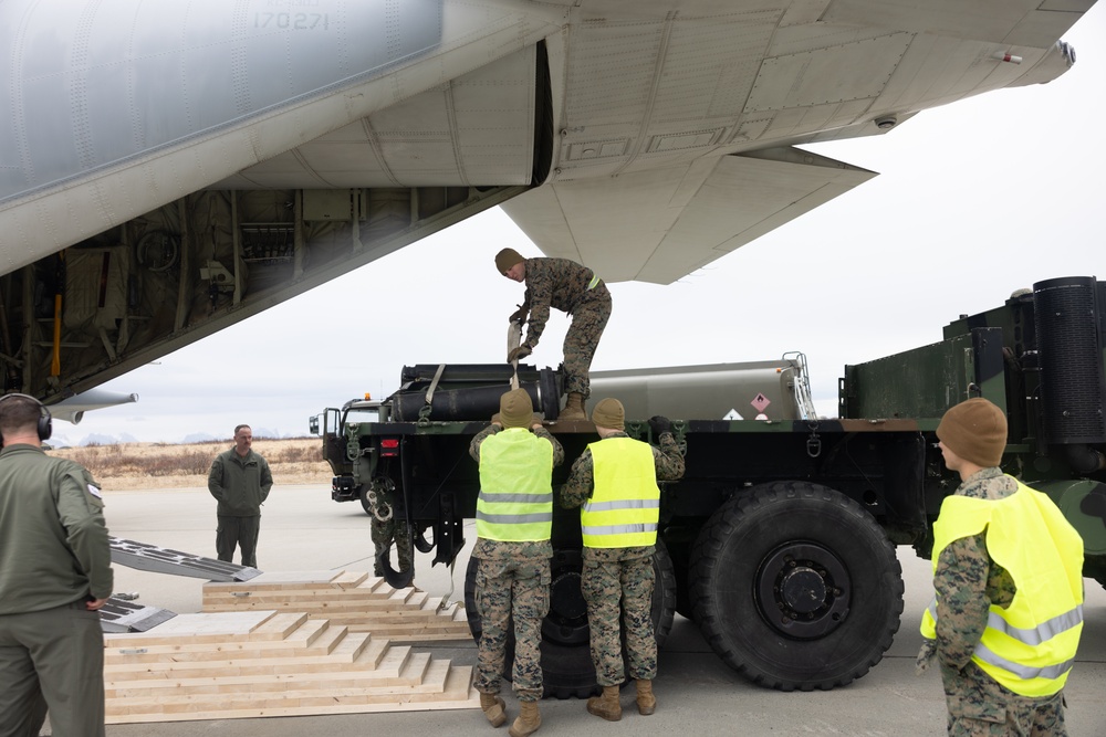 U.S. Marines Load KC-130 for Movement to Scotland