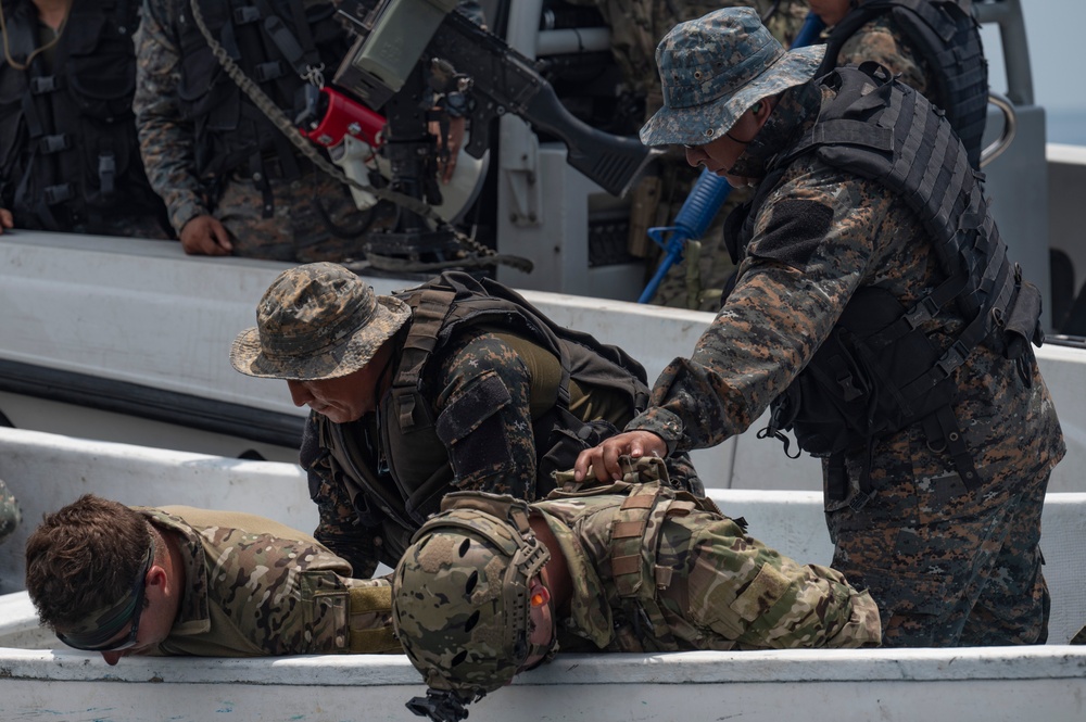 U.S. Navy Special Warfare and Guatemalan combat crewman execute drug interdiction exercise