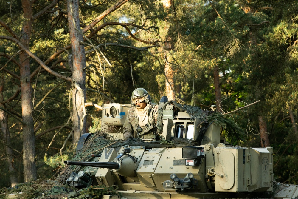 M2A3 Bradley Infantry Fighting Vehicle simulates an assault