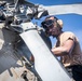 Nimitz Sailor Performs Pre-Flight Inspection on a Helicopter
