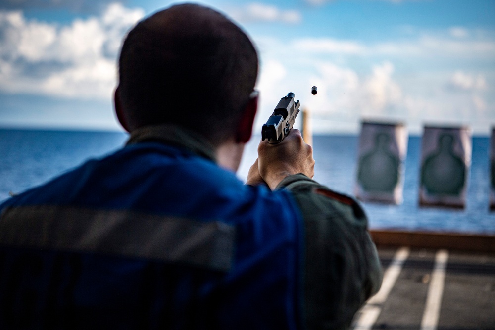 Nimitz Sailor Fires an M9 Service Pistol