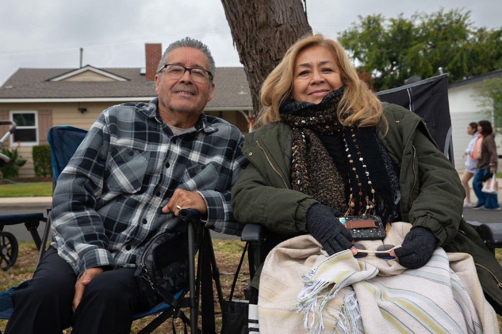Couple watches parade