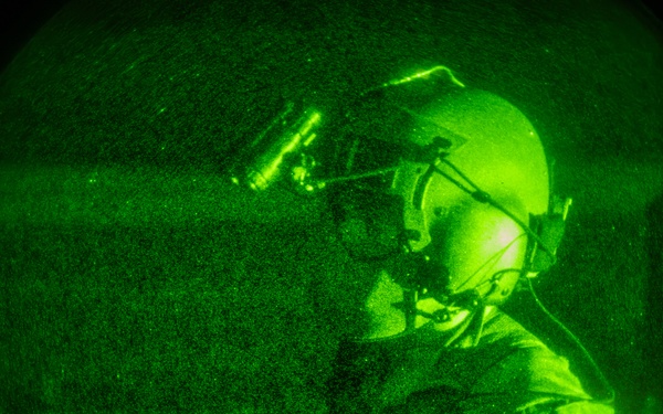 Florida Army National Guard aviation Soldiers demonstrate aerial gunnery skills during night time operations at CBJTC