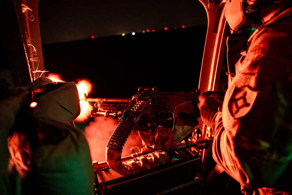 Florida Army National Guard aviation Soldiers demonstrate aerial gunnery skills during night time operations at CBJTC