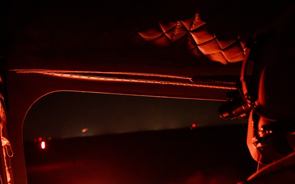 Florida Army National Guard aviation Soldiers demonstrate aerial gunnery skills during night time operations at CBJTC