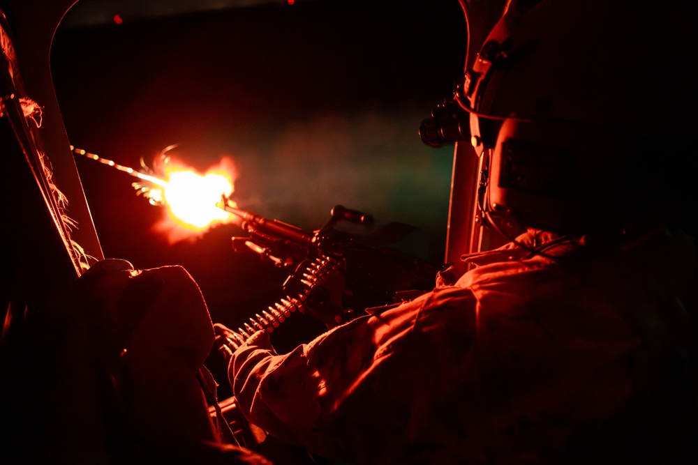 Florida Army National Guard aviation Soldiers demonstrate aerial gunnery skills during night time operations at CBJTC