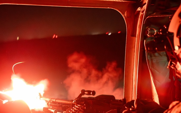 Florida Army National Guard aviation Soldiers demonstrate aerial gunnery skills during night time operations at CBJTC