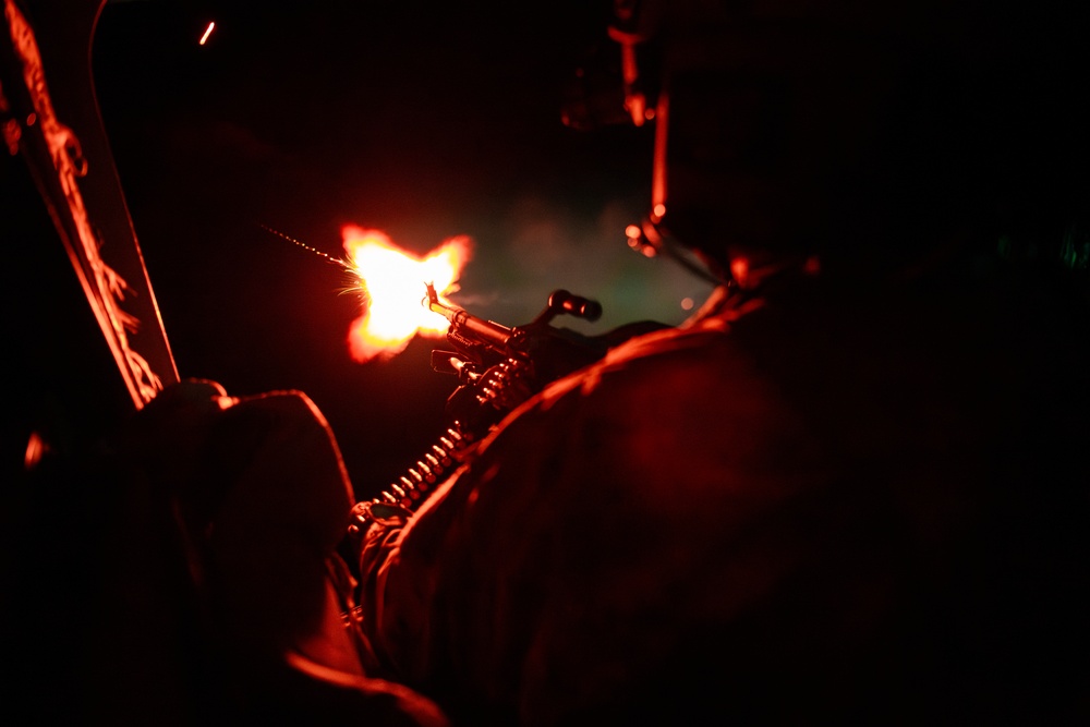 Florida Army National Guard aviation Soldiers demonstrate aerial gunnery skills during night time operations at CBJTC
