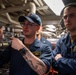Sailor Gives Aft-Steering Training