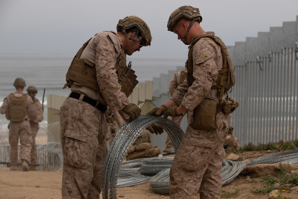 U.S. Marines reinforce barrier along the southern border