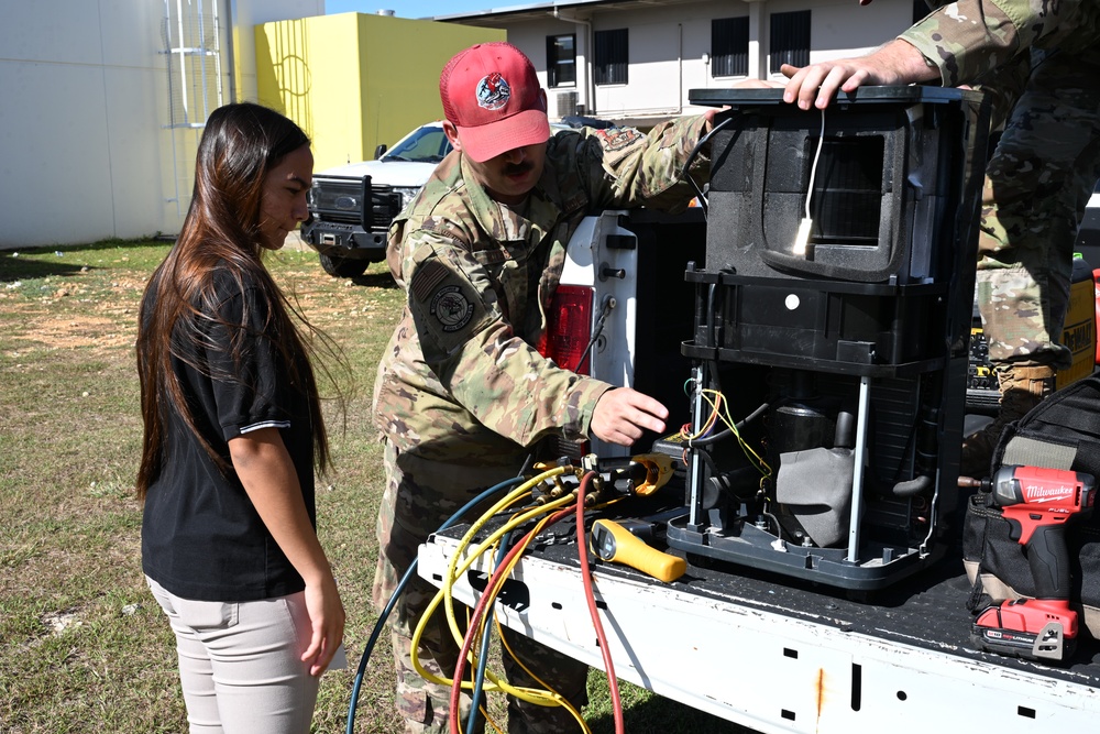 Team Andersen Airmen volunteered at the Tiyan High School Transportation, Logistics, and Construction Boot Camp