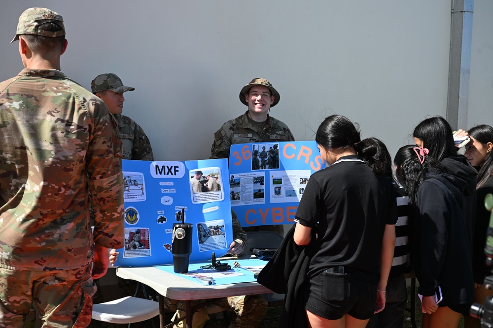 Team Andersen Airmen volunteered at the Tiyan High School Transportation, Logistics, and Construction Boot Camp