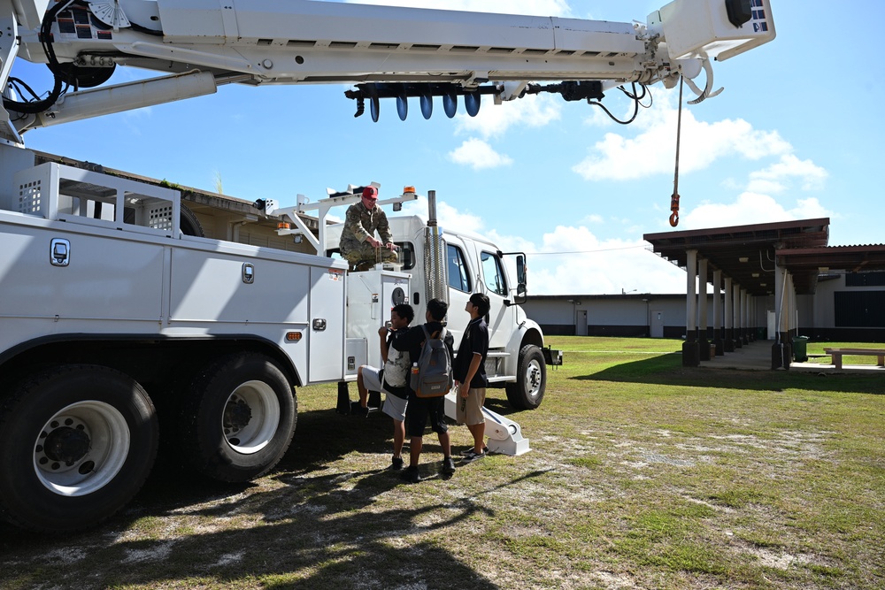 Team Andersen Airmen volunteered at the Tiyan High School Transportation, Logistics, and Construction Boot Camp