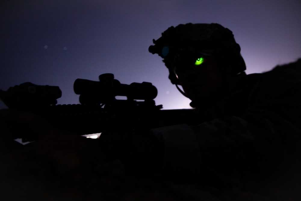 Soldiers conduct nighttime security operations along the southern border