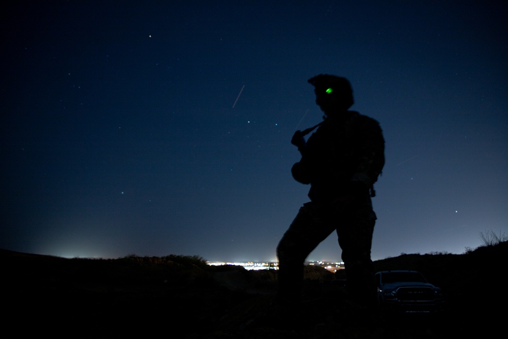 Soldiers conduct nighttime security operations along the southern border