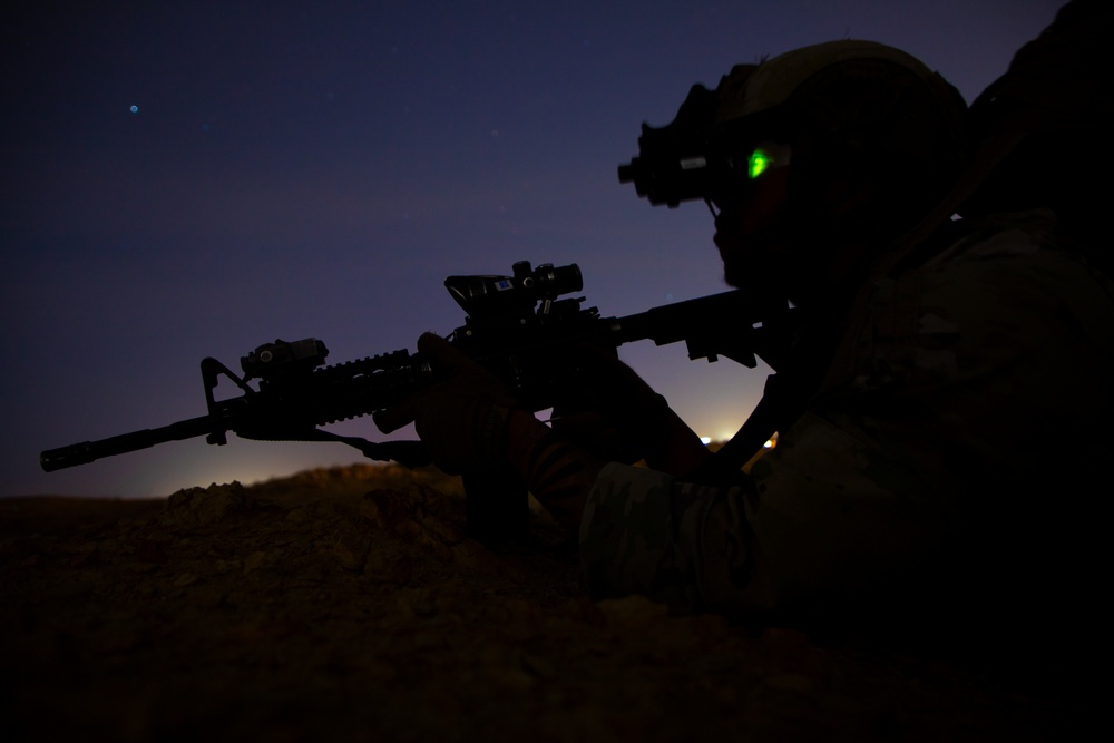Soldiers conduct nighttime security operations along the southern border