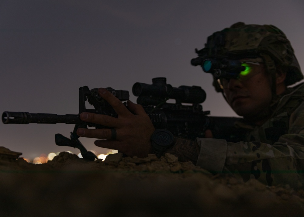 Soldiers conduct nighttime security operations along the southern border