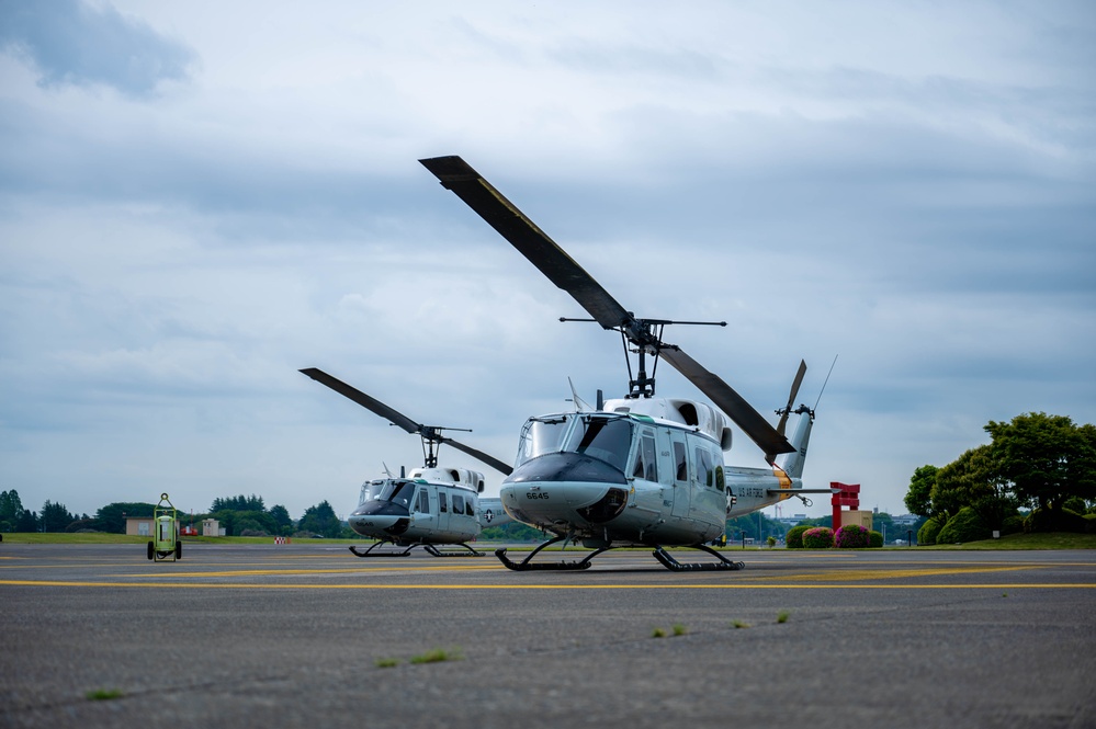 459 AS completes formation flight with UH-1N