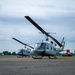 459 AS completes formation flight with UH-1N