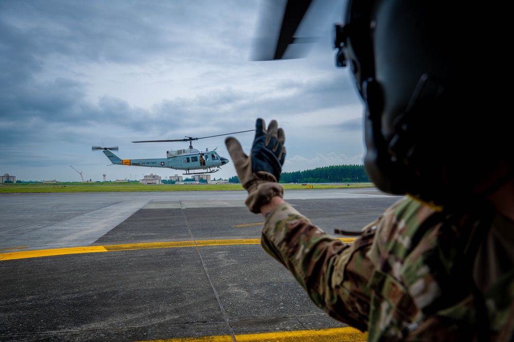 459 AS completes formation flight with UH-1N