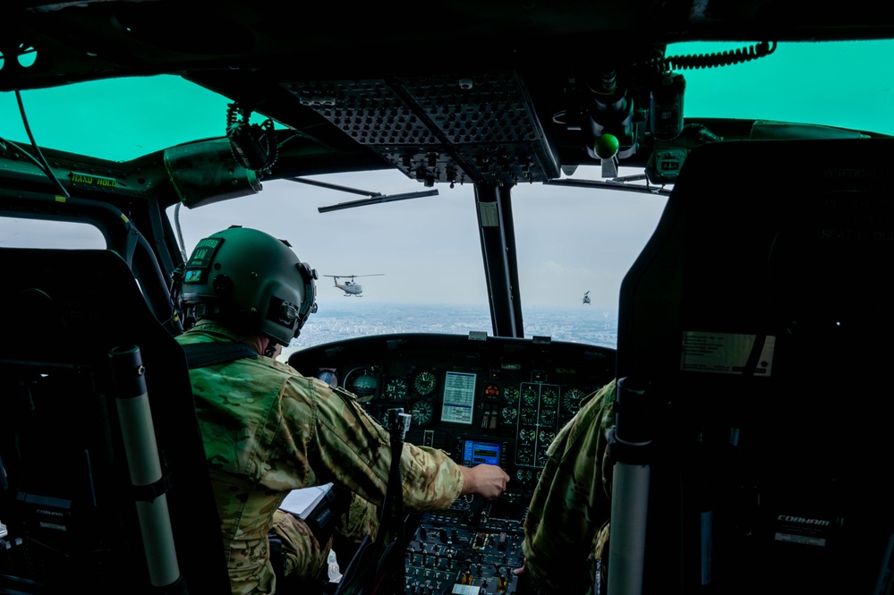 459 AS completes formation flight with UH-1N