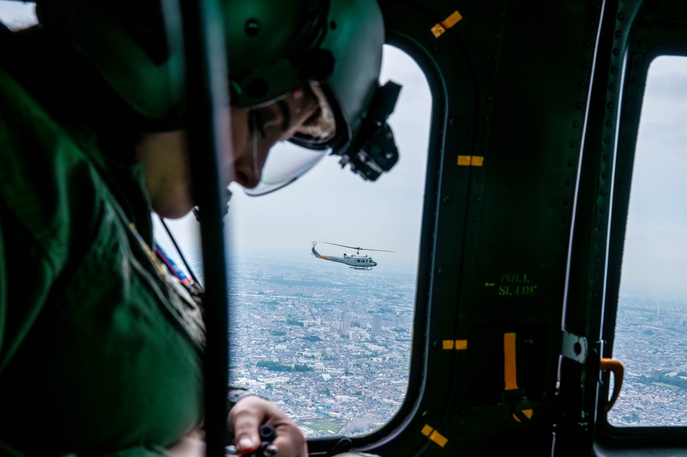 459 AS completes formation flight with UH-1N