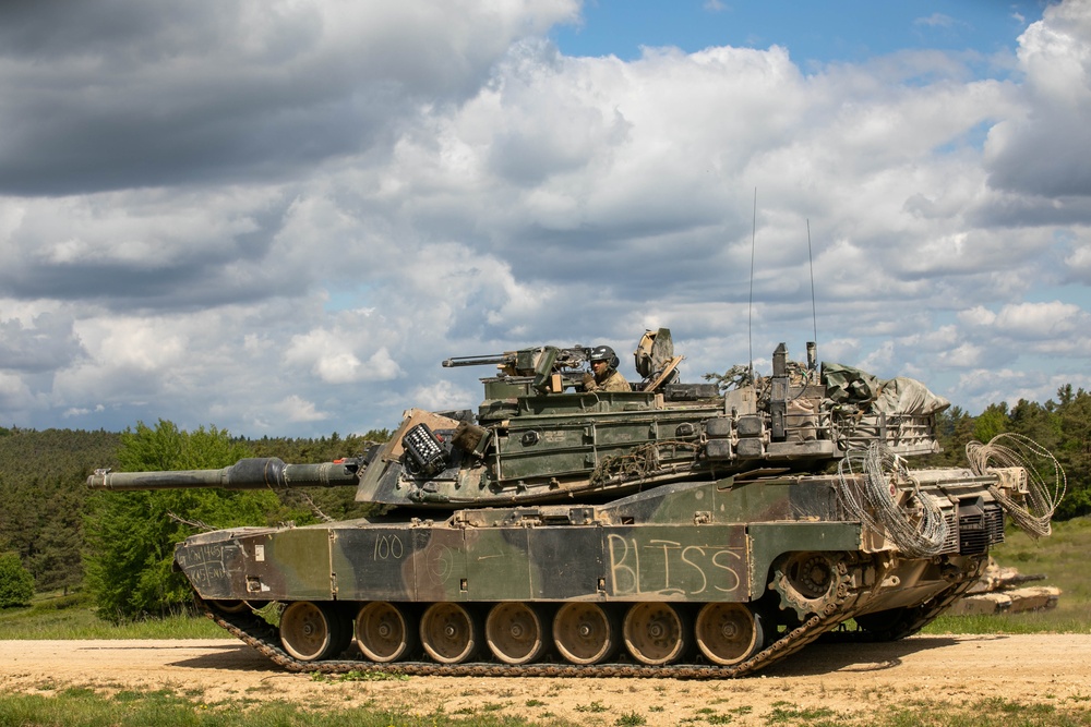 U.S. Army maneuver a M1A2 Abrams to simulate an assault during Combined Resolve 25-2