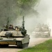 U.S. Army maneuver an M1A2 Abrams to simulate an assault during exercise Combined Resolve 25-2