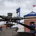 An AH-64D sits outside NBT Bank Stadium