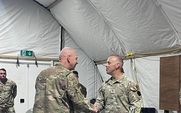 Coin presented to Cohen, Shea