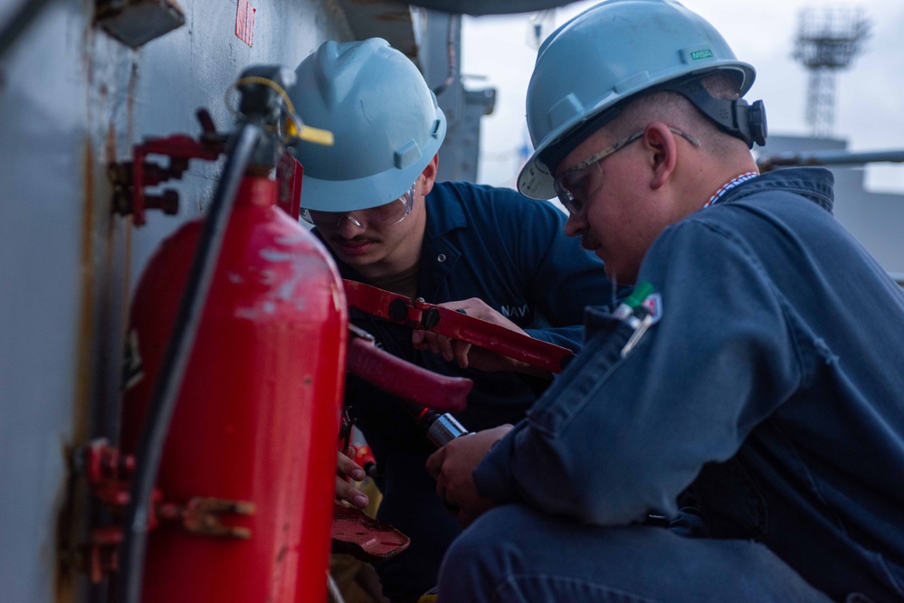 USS Ronald Reagan (CVN 76) Sailors conduct maintenance